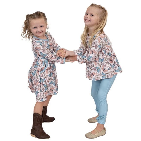 Long sleeved butterfly print tunic top with solid color blue fitted bottoms - Picture 6 of 9